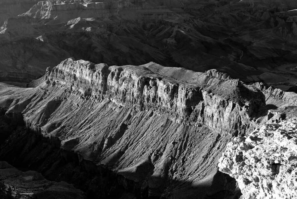 moody black and white image of the grand canyon to accompany a grand canyon travel guide